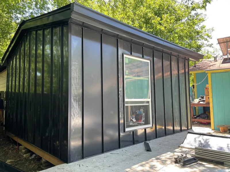 Black standing seam metal wall panels for Roof Inspection in Odessa