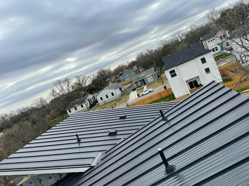 Standing seam metal roof panels with vents for Skylight Repair in Odessa
